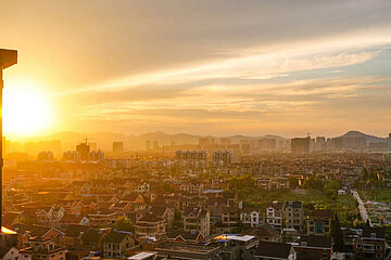 Sonne über der Stadt