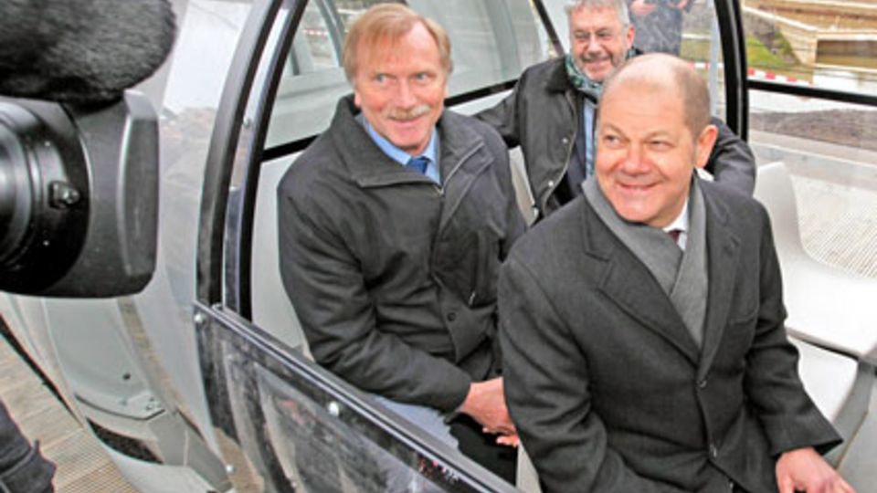 Olaf Scholz und Heiner Baumgarten