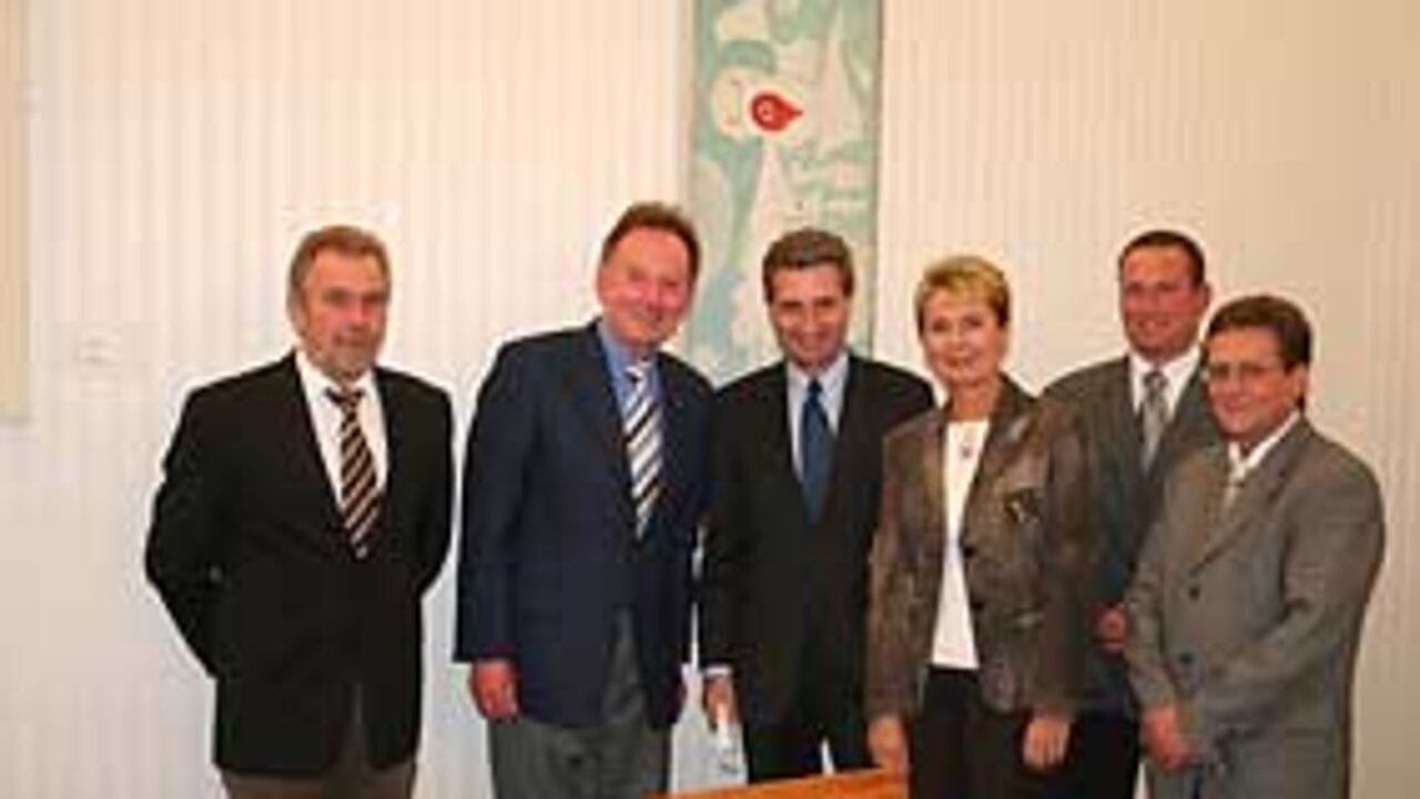Günther Oettinger und Landschaftsgärtner