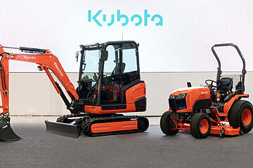Traktor und Baumaschine