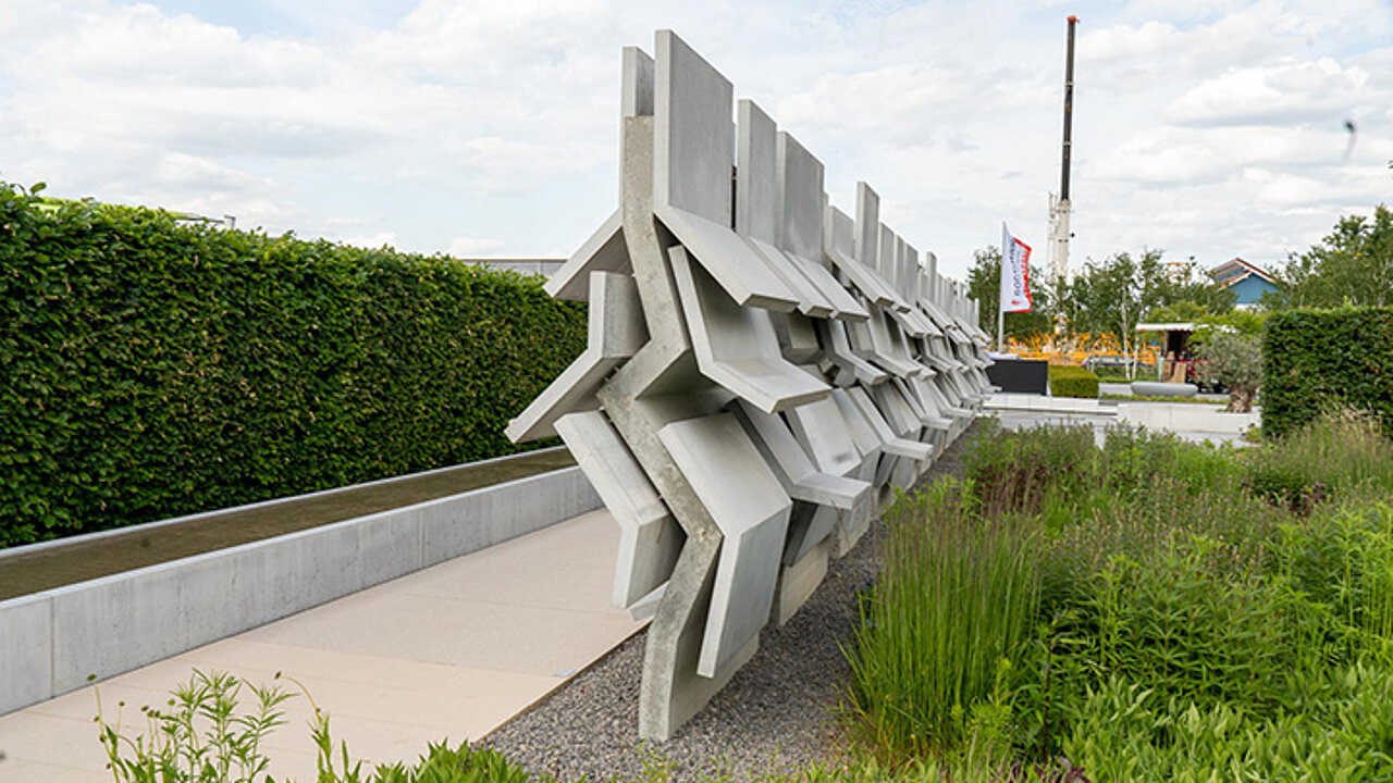 Immergrüne Hecke aus Beton